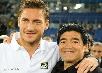 Totti e Maradona TuttoASRoma.it TOTTI Ricorda Maradona: "Hai scritto la storia del calcio" (SOCIAL) Tutte le News AS Roma FC Notizie Calendario Partite Calciomercato Info Biglietti Store