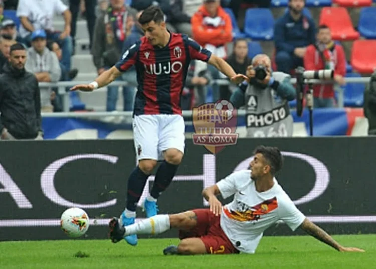 Lorenzo Pellegrini contrasta un avversario in Bologna-Roma 22 09 2019 - Photo by Getty Images